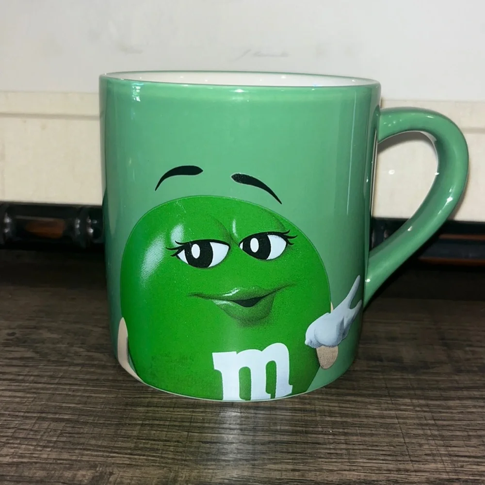 M&M’s Green ‘Lady’ coffee mug. “EAT YOUR Heart OUT, DARLING!’” Double Sided 201